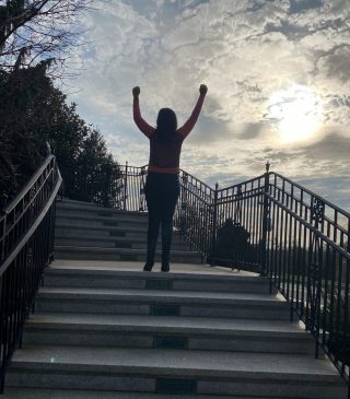 Victorious Author on Stairs